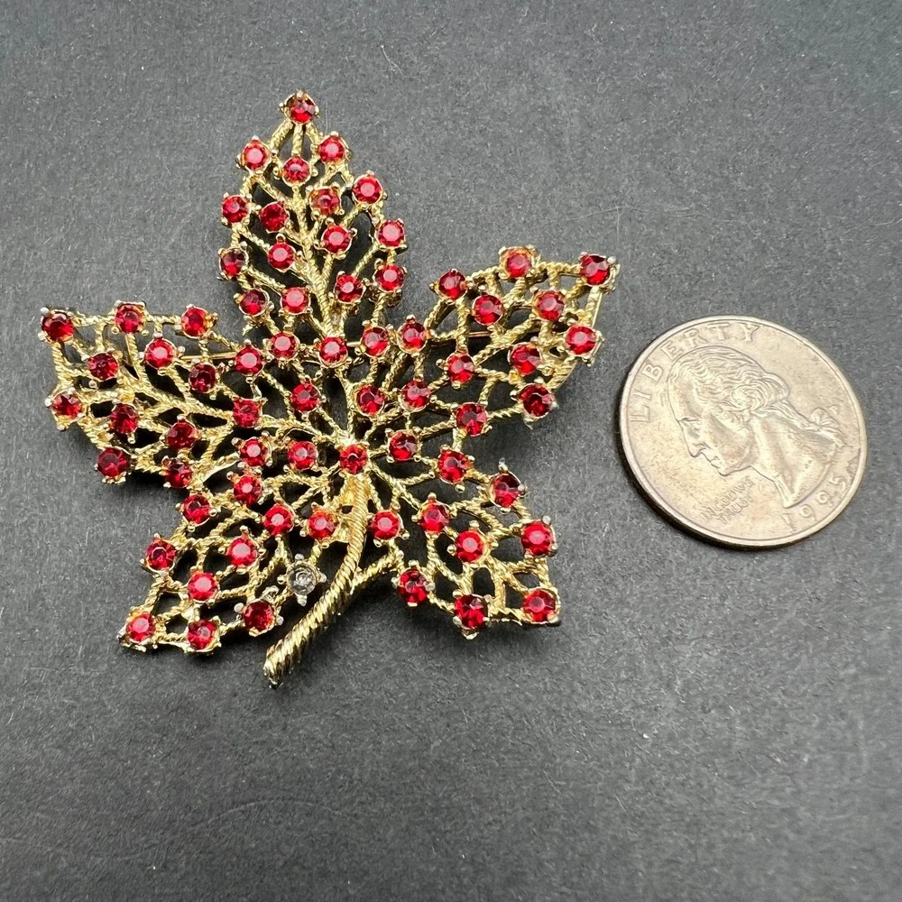 Gold Tone Leaf Brooch Red Rhinestone Accents Textured Openwork Vintage Style Pin